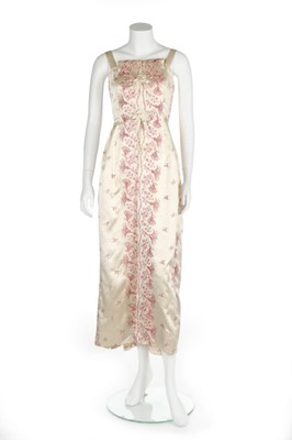 Lot 86 - An embroidered ivory satin couture evening...