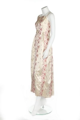 Lot 86 - An embroidered ivory satin couture evening...