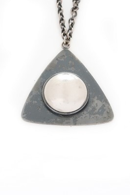 Lot 118 - A Pierre Cardin tri-angular pendant necklace,...