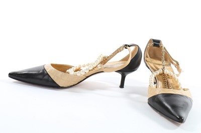 Lot 51 - Chanel footwear, comprising black and ivory...