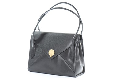 Lot 53 - A Smythson black leather 'envelope' bag, lined...