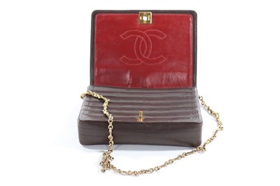 Lot 71 - A Chanel brown quilted leather handbag, 1980s,...