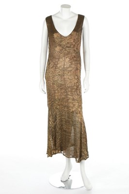 Lot 110 - A gold lamé and sage-green crepe bias-cut gown,...