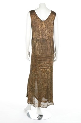 Lot 110 - A gold lamé and sage-green crepe bias-cut gown,...