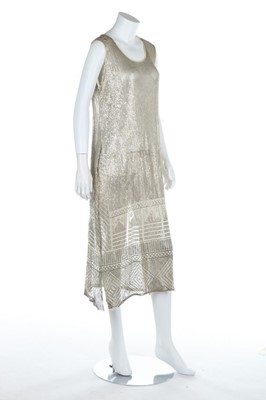 Lot 123 - A beaded silver tunic c.1914, the tulle ground...
