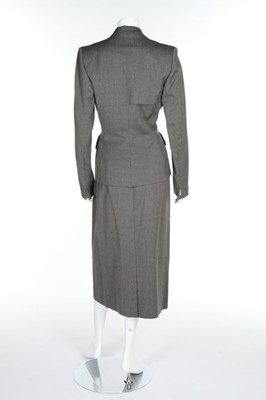 Lot 128 - A Gilbert Adrian grey wool suit, early 1950s,...