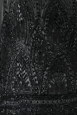 Lot 143 - A black chiffon tunic, circa 1925-26,...