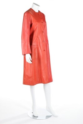 Lot 151 - A Halston red and orange leather coat, late...