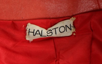 Lot 151 - A Halston red and orange leather coat, late...