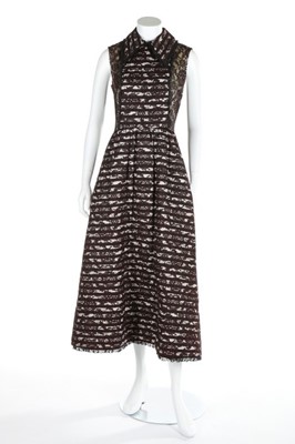 Lot 153 - A Geoffrey Beene boutique lace maxi dress,...
