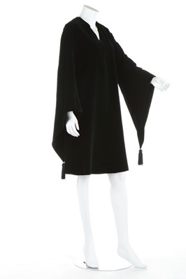 Lot 156 - An Yves Saint Laurent black velvet dress, late...