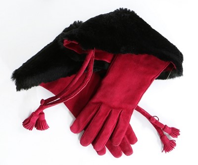 Lot 163 - A pair of Hermès deep red suede gloves, 1980s,...