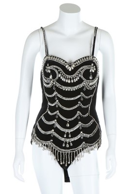 Lot 192 - A black velveteen 'Tiller Girl' costume, from...