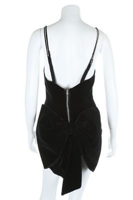 Lot 192 - A black velveteen 'Tiller Girl' costume, from...