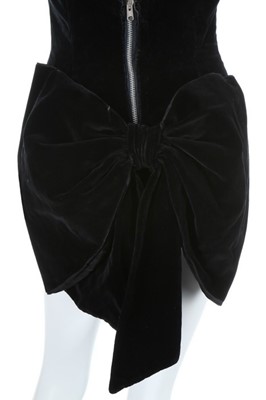 Lot 192 - A black velveteen 'Tiller Girl' costume, from...