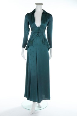 Lot 217 - An Ossie Clark peacock blue satin backed crepe...