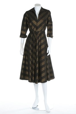 Lot 223 - Three Utility dresses, 1940s, all with CC41 or...