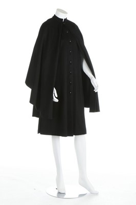 Lot 234 - An Yves Saint Laurent black wool cape, 1970s,...