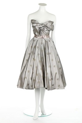 Lot 238 - A Christian Dior New York brocaded grey satin...