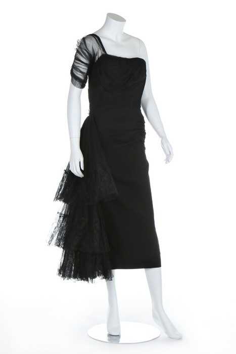 Lot 229 - A Gilbert Adrian black crepe and tulle dress...