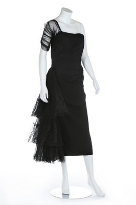 Lot 229 - A Gilbert Adrian black crepe and tulle dress...