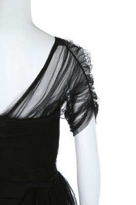 Lot 229 - A Gilbert Adrian black crepe and tulle dress...