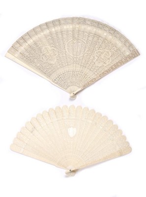 Lot 60 - Two carved ivory brisé fans, Chinese for the...