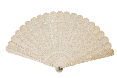 Lot 61 - A carved ivory brisé fan, Chinese for the...