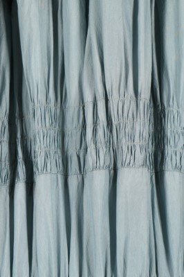 Lot 99 - A Jeanne Lanvin couture pale blue shirred silk...