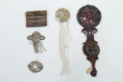 Lot 210 - A group of beaded motifs, trimmings and...