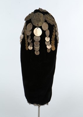 Lot 373 - A woman's black velvet hood (Gargush), Sana'a,...