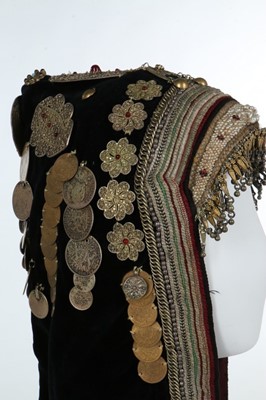 Lot 373 - A woman's black velvet hood (Gargush), Sana'a,...