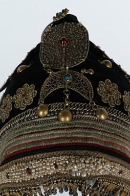 Lot 373 - A woman's black velvet hood (Gargush), Sana'a,...