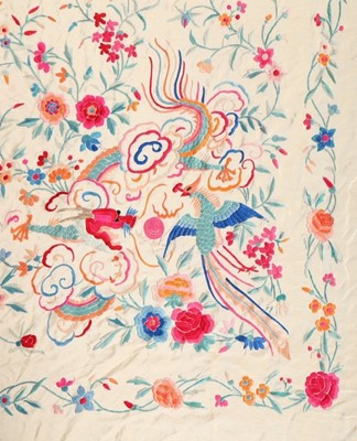 Lot 388 - An embroidered pale yellow silk shawl,...