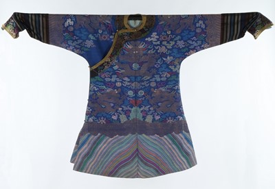 Lot 390 - A brocaded silk dragon robe, jifu, circa 1900,...