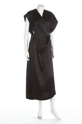 Lot 307 - A Comme des Garçons black satin pinafore dress,...