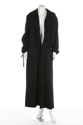 Lot 308 - A Yohji Yamamoto black wool coat, 1990s,...