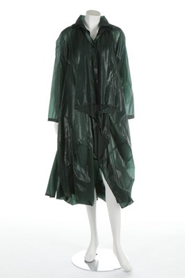 Lot 310 - An Issey Miyake green nylon coat, labelled,...