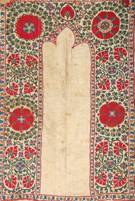 Lot 367 - An embroidered suzani prayer arch, Bokharan,...