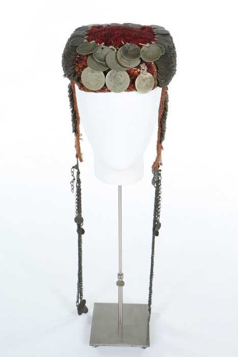 Lot 371 - A coin adorned headdress or 'money hat',
