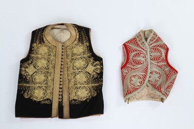 Lot 386 - Six embroidered waistcoats and jackets,...