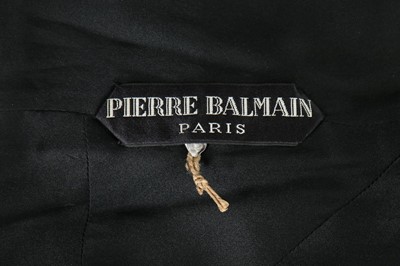Lot 1 - A Pierre Balmain couture black velvet evening...