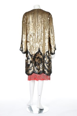 Lot 16 - A gold and black sequinned evening coat, 1920s,...