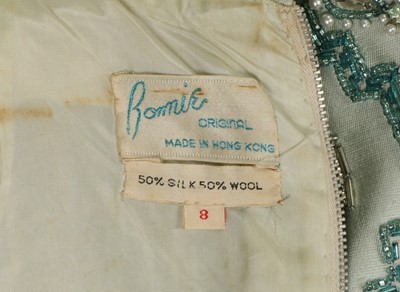 Lot 33 - A Bonnie Original be-jewelled pale blue silk...