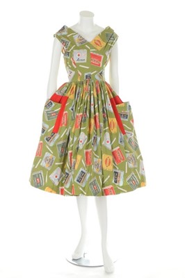Lot 39 - Two novelty printed cotton dresses, 1950s, one...