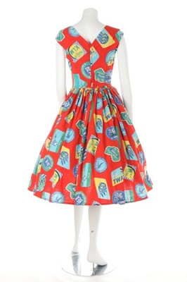 Lot 39 - Two novelty printed cotton dresses, 1950s, one...