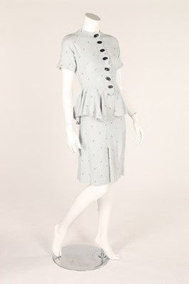 Lot 80 - A 1940s powder blue skirt suit, with repeating...