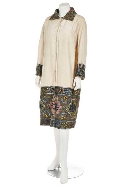 Lot 151 - An ivory linen-silk coat with Turkish