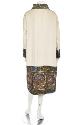 Lot 151 - An ivory linen-silk coat with Turkish...