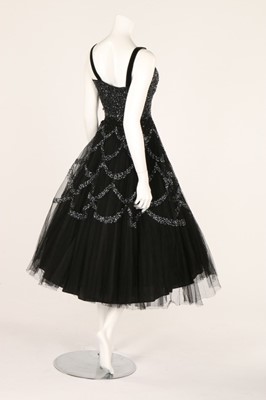 Lot 81 - Two prom style dresses, 1950s, one black with...
